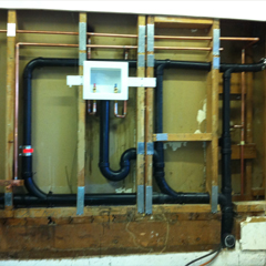 Tony's Plumbing Co an Image of a Laundry Drain System Installation